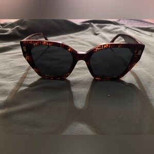 Fendi Roma
Havana acetate sunglasses